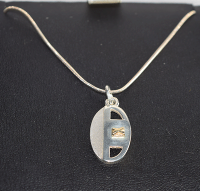 Silver Pendant with Gold Flag